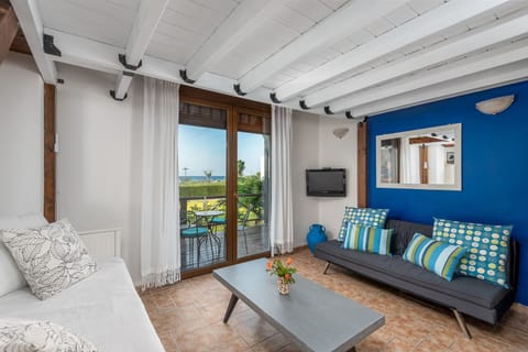 Living room area and veranda offering great sea view