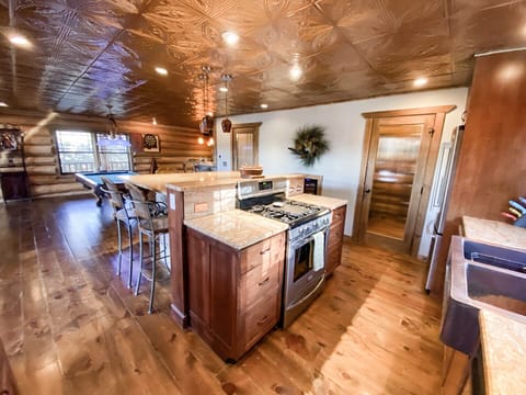 The Kitchen features a huge walk-in pantry, ample counter space and state of the art stainless steel appliances