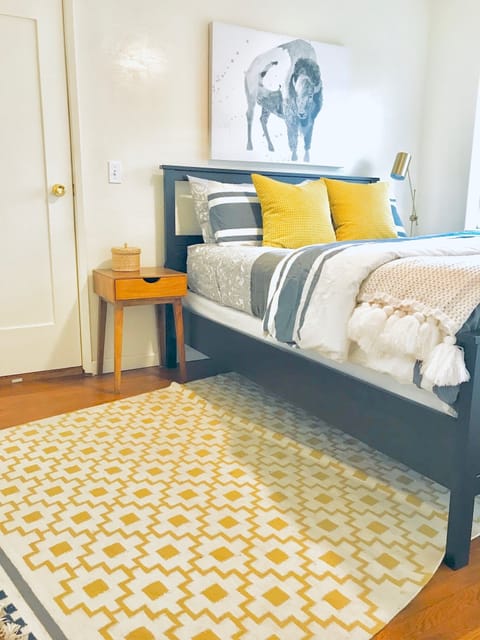 Queen Bed with comfortable cotton sheets, soft blankets and cozy comforter.