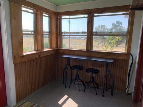The front room is perfect for enjoying a cup of coffee and the views. 