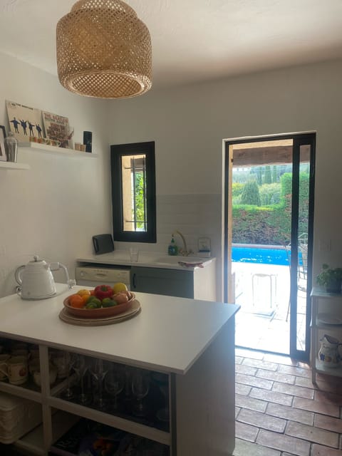 Kitchen island leading out to pool 