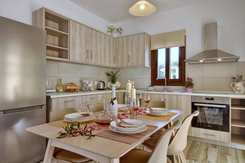 Lefkimmiatis Villa Elaia dining and kitchen area