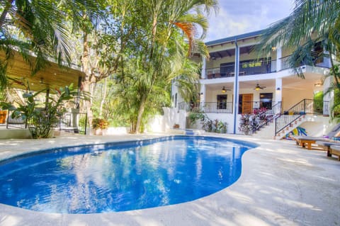 Casa Blanca main house from pool with rancho