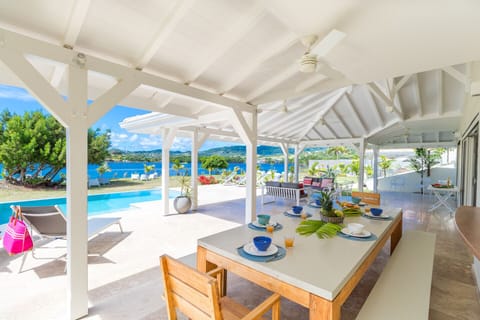 Located on the Presqu'ile du Cap Est, Villa Celadon combines Caribbean architecture with modern materials and colours.