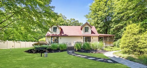 Feel the peace surround you as you walk through our spacious front yard, away from Upper Scott Lake, toward the Upper Scott Lake Retreat.