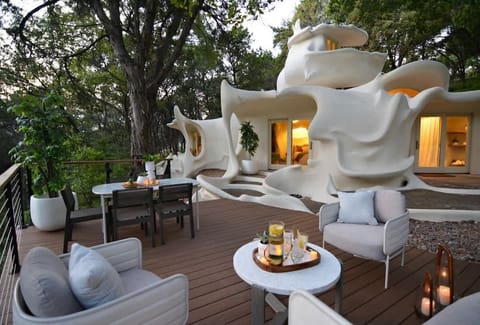 The iconic Bloomhouse—an architectural escape where nature, design, and romance come together.