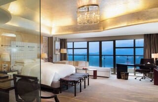 Premium bedding, down comforters, minibar, in-room safe
