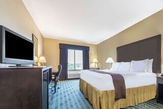 Premium bedding, pillowtop beds, desk, blackout drapes