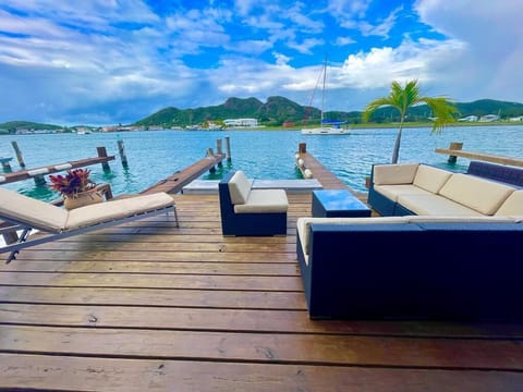 Experience the ultimate island lifestyle on this expansive private deck, perfectly positioned at the water's edge.


