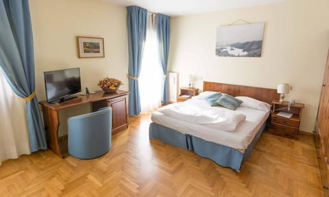 Classic Double Room, City View | Minibar, in-room safe, individually decorated, individually furnished