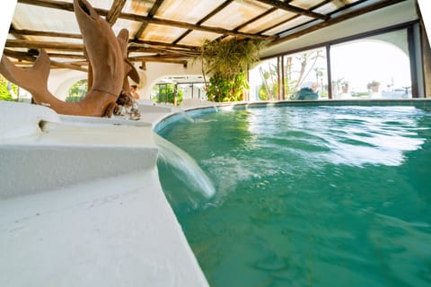 Indoor pool, seasonal outdoor pool, pool umbrellas, sun loungers