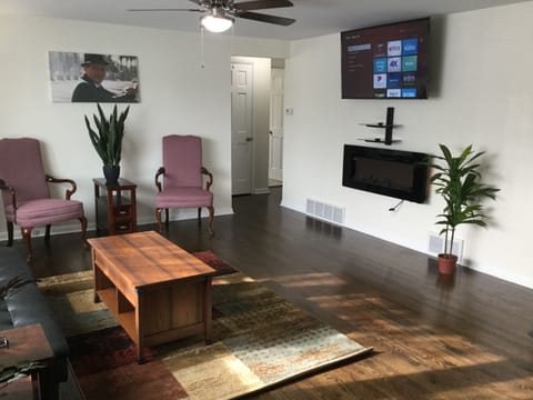 Enjoy watching TV in this cozy newly furnished living room.
