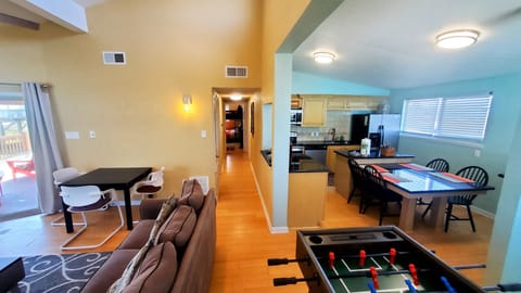 Family room, hallway to the bedrooms and bathrooms and Kitchen