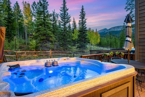 Private Hot Tub on quiet deck.  Ski in/out, winter shuttle to Peak 9, On Trails.