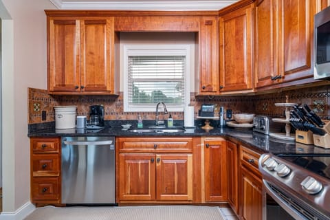 Kitchen is fully stocked with Vitamix, Keurig, Coffee Maker, Alexa, Waffle iron.