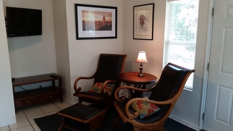 Living area with beautiful hand crafted leather chairs