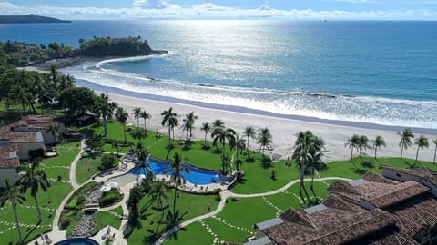 This one-of-a-kind property boasts direct beach access. 