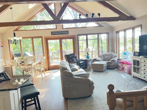 Spacious, room with lots great room windows and beautiful views