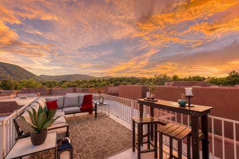 Private rooftop deck with sweeping 360° views—perfect for a comfortable sunset.