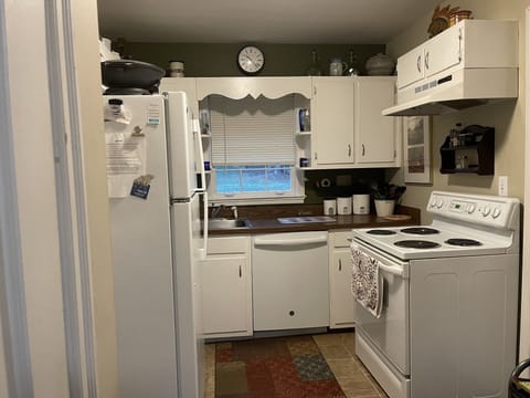 full kitchen with coffee maker, toaster and everything to cook a meal.