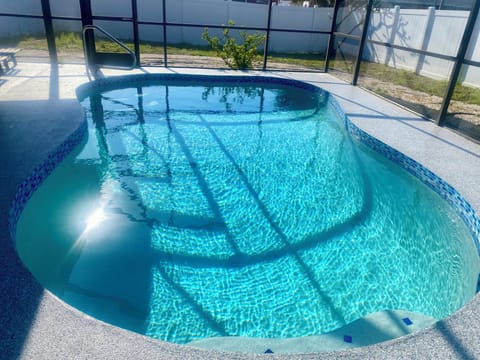 Newly resurfaced lanai and retiled pool. Heated in winter.