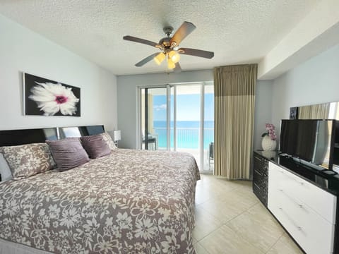 Master bedroom king bed, ocean view and private exit to the balcony  .