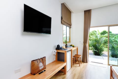 Room, 1 King Bed, Garden View | In-room safe, individually decorated, individually furnished, desk