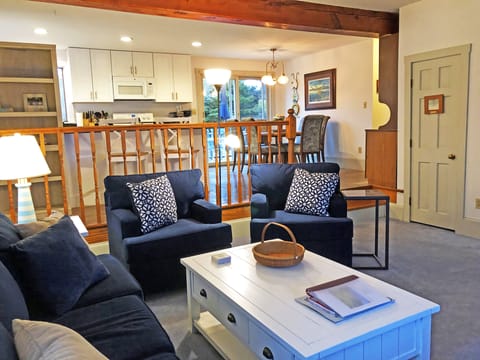 Living room open to kitchen and dining