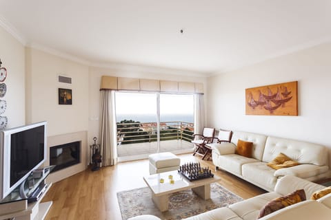 Apartment, 2 Bedrooms, 2 Bathrooms, Sea View | Living area | Flat-screen TV