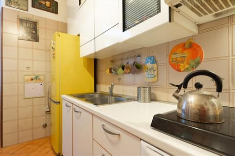 Apartment, 2 Bedrooms | Private kitchen | Full-size fridge, stovetop