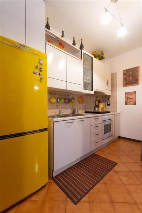 Apartment, 2 Bedrooms | Private kitchen | Full-size fridge, stovetop