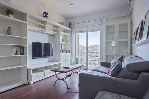 Basic Apartment, 3 Bedrooms, Non Smoking, Balcony | Living room | Flat-screen TV