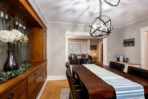 Dining area right off the living room. It also has a Little coffee station 