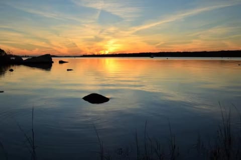 Sunset View of Quonnie Salt Pond from the Home's Shorefront