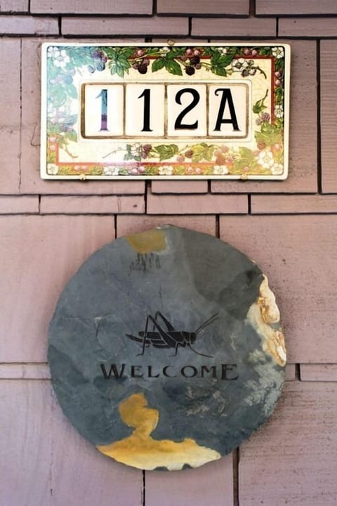 Front door, middle unit 112A.