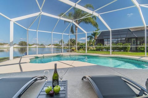 Relax by the pool and enjoy the lake view