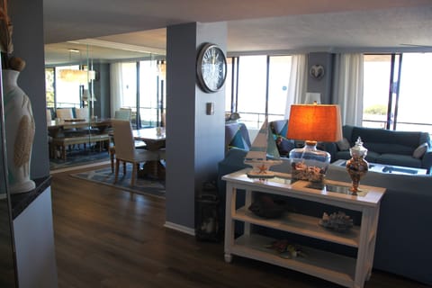 Entering into the condo, view the panoramic views from Gulf of Mexico to Bay.