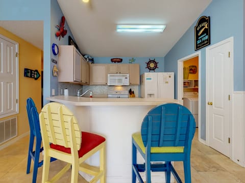 Kitchen and Breakfast bar with stools