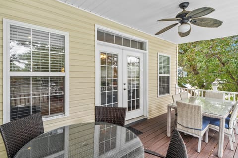 Deck off of main level overlooking the pool