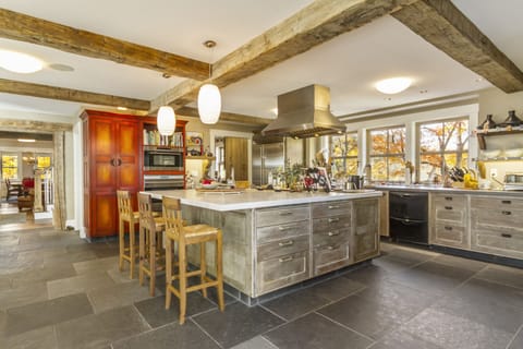 Spacious kitchen with high-end appliances, and the huge couch is to the left!