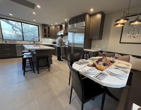 Kitchen booth seats 6-8 easily, and up to 10! Center, Island seats 4.