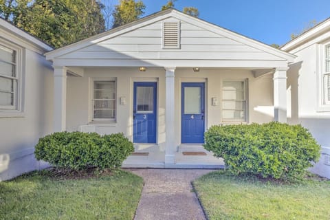 Cottage vibes, comfort inside, and a cheerful blue door to greet you.