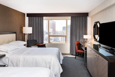 Premium bedding, down comforters, in-room safe, desk