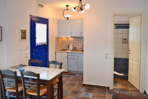 Apartment, 1 Bedroom, Sea View | Private kitchen | Full-size fridge, microwave, stovetop, coffee/tea maker
