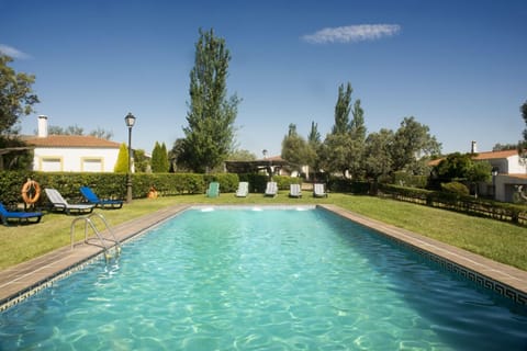 Seasonal outdoor pool, pool umbrellas, sun loungers