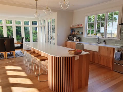 Well equipped kitchen with marble bench top and quality appliances