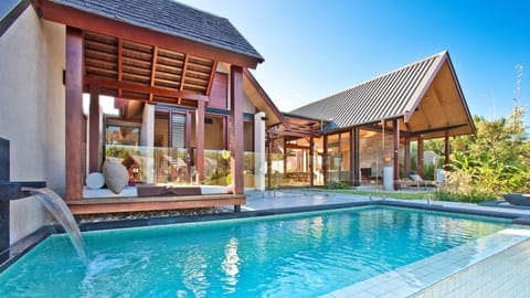 heated pool with view of the lilies