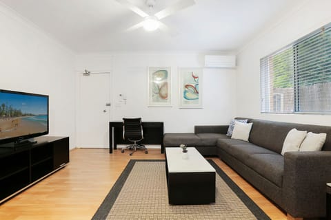 Lounge Room with study desk and Reverse cycle air-conditioner