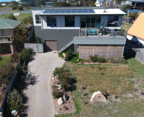 Granite Beach House exterior - solar panels