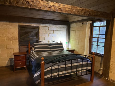 Queen bed in loft bedroom